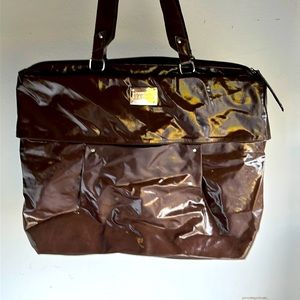 Brown Kenneth Cole Reaction bag.